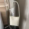 Bolsa de ombro casual de grande capacidade, novo estilo verão 2026, bolsa tote fofa estilo coreano nicho com estampa de estrela para mulheres