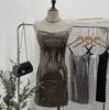 Vestido de tirantes brillante y sexy europeo y americano de tiro real, falda ajustada a la cadera para niña pequeña y sexy 1387