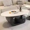 Nueva mesa de centro ovalada de losa de roca de lujo ligero estilo italiano para apartamentos pequeños, sala de estar moderna, uso doméstico simple, almacenamiento combinado de alta gama