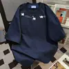 Camiseta Casual de Verano Suelta con Estampado de Graffiti y Letras para Mujer con Diseño de Nicho y Top Versátil para el Trabajo 2026