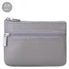 Cartera mini de cuero genuino directo de fábrica versión coreana de linda bolsa para monedas con cremallera monedero con cremallera se puede distribuir agente