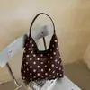 Bolso de gamuza para mujer 2026 nuevo de moda otoño vintage Maillard bolsa de mano para la ciudad gran capacidad bolso de hombro