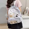 Mochila de ensino fundamental com estampa de bolinhas para meninas, grande capacidade, temática de anime, transparente, com um design fofo, adequada para carregar livros
