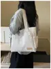 Nova bolsa de ombro feminina transfronteiriça, cor sólida, simples e casual, bolsa de mão de tecido, versátil para o trabalho e estudantes, bolsa tote