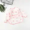 Paraguas niños impermeable babero manga larga mameluco impermeable bebé tafetán de poliéster para bebé ropa de comedor impermeable al por mayor