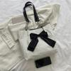Bolsa Feminina Estilo Coreano 2022 Nova Bolsa Tote de Nicho com Laço Grande Capacidade de Verão Versátil Bolsa de Ombro Simples e Versátil