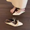 Mules cerrados de moda nicho de Hong Kong con lazo para mujer, nuevo estilo verano 2025, sandalias que aumentan la altura