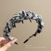 Diadema retro estilo francés con estampado de leopardo para mujer, adecuada para el uso diario, diseñada para mantener el cabello en su lugar y hacer que la cara parezca más pequeña, un accesorio para el cabello que realza la apariencia de la coronilla.
