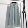 Foto real de jeans cropped de pierna ancha color azul oscuro vintage con dobladillo enrollado para mujer, de cintura alta, talla grande, pantalones de pierna recta para mujeres petite, colección de otoño
