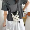 Nuevo bolso cruzado minimalista versátil de lunares para mujer, bolso de teléfono de moda de nicho, bolso de hombro y cruzado de alta gama para el día a día