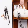 Novo Pingente de Bolsa Série Miu Corda Trançada à Mão DIY Chaveiro Versátil Presente para Casal Desenho Animado Atacado