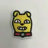 Fábrica Xiaoshan Qixiu Pegatinas de Tela Bordadas con Letras de Punto para Figuras Accesorios de Ropa Pegatinas Decorativas Etiquetas Bordadas