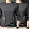 Camiseta de manga larga para hombre, capa interior de otoño para hombre, camiseta base elástica de corte holgado, camiseta estampada estilo coreano ins para hombre