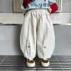 Calças de Algodão Botonadas com Corte Curvo para Meninos na Primavera e Outono, Estilo Coreano Elegantes e Largas Casuais para Crianças, Calças de Bebê da Moda