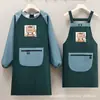 Nuevo Delantal Impermeable para Cocina y Uso Doméstico, de Manga Larga, Resistente al Aceite, Ropa de Trabajo para Restaurante, Mono sin Lavado, Resistente a las Manchas, Ropa de Trabajo para Hombres con Texto Impreso
