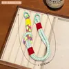 Colgante de Cordón Multifuncional de Colores, Correa Personalizada Anticaída para Teléfono, Llavero, Correa Larga Tejida Trendy de Dopamina para Bolso