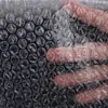 Fábrica directa de Guangdong film de burbujas nuevo material importado film de cojín de aire Film de burbujas de capa única burbuja gruesa