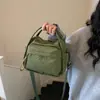 Bolsa Pequena de Nylon Casual, Leve e Versátil, Nova Moda 2026 Feminina para Ombro e Transversal, Bolsa de Mão para o Dia a Dia