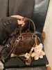 Bolsa de Boliche de Mão de Luxo para Mulheres 2026 Nova Moda Pequena Embossada Versátil Elegante Bolsa de Ombro Transversal