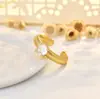 Patrón tejido estilo vintage 2026, repujado en oro, acabado cepillado, anillo abierto de banda estrecha, diseño de nicho, estilo minimalista, anillo de alta resistencia