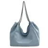 Bolsa de brim de grande capacidade para mulheres, leve, novo modelo outono 2026, bolsa de ombro para estudante universitário, bolsa tote com corrente