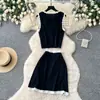 Chal sin mangas de retazos de encaje estilo francés ligeramente maduro Falda de cintura alta Conjunto de punto elegante de dos piezas para mujer Verano 2026