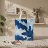 Bolsas no tejidas laminadas pintadas para niños, superventas transfronterizas, recuerdos para fiestas navideñas, bolsitas para snacks, bolsas de regalo para cumpleaños infantiles
