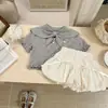 Conjunto de Verano para Niñas 2026 Nuevo Estilo Moda Coreana Tejido de Punto Manga Corta Elegantes Shorts Florales Conjunto de Dos Piezas para Bebés