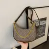 La bolsa popular de este año para mujer 2025 nueva moda cadena bandolera todo-partido bolsa de media luna bandolera bolso de hombro para mujer tendencia