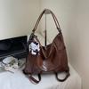 Mochila Nova 2025 de Grande Capacidade para Deslocamento Retrô Casual Tendência de Rua Ombro Único Mochila de Viagem Bolsa Tote Mulher