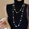 Nuevo collar de perlas artificiales de doble capa, cadena para la clavícula de moda exquisita transfronteriza, cadena de suéter de lujo ligero estilo francés