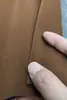 Suministro puntual de tejido flocado autoadhesivo de franela spunlace gris, fabricantes de tejido flocado autoadhesivo