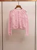 Cardigan de Tricô Gola Redonda Rosa com Crochê Tridimensional Vazado Estilo Doce Novo da Primavera Roupas Femininas de Alta Qualidade Shenzhen Nanyou
