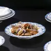 Conjunto de decoração de mesa de cerâmica estilo chinês para hotel restaurante restaurante Tigela e prato comercial conjunto de quatro peças resistente a altas temperaturas cor sob esmalte Alto senso