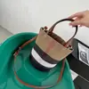 Bolso Cubo de Retazos de Cuero Genuino Rayado de Diseño de Nicho para Mujer 2026 Nueva Moda Clásico de Hombro Único Casual Versátil