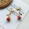 Gota de aceite tridimensional capullo de rosa invertido accesorios de aleación diy aretes hechos a mano collar al por mayor