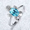 Anillo de tortuga colorido de platino y diamante azul más vendido transfronterizo moda para hombres y mujeres anillo simple una generación de venta al por mayor