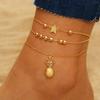 Tobillera de moda simple de alta gama multicapa apilada con cuentas de estrella de piña para mujer, traje de tobillera de aleación plateada al por mayor