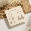 Conjunto Doce de Brincos de Biocerâmica Antialérgicos Cuidado para Piercing de Orelha em Resina Coleção Popular de Brincos de Cerâmica Joias de Orelha para Venda no Atacado para Barracas