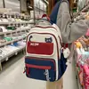 Mochila casual leve de grande capacidade 2026 estilo coreano ins alto valor estilo universitário mochila color block