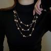 Collar de perlas multicapa ultralargo y exagerado, estilo retro europeo y americano, elegante y de alta gama, de celebridades de Internet para mujer.