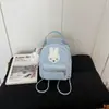 Mochila de estilo coreano con estampado de lunares, conejo y estrellas en bloques de color para estudiantes, bolsa escolar de gran capacidad, mochila linda y elegante para niñas