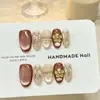 Flor Dorada Pequeña Atardecer Uñas Portátiles Puras Hechas a Mano Uñas Postizas Ojo de Gato Súper Brillantes Venta al por Mayor Uñas de Gel Pegatinas para Uñas