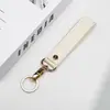 2025 Nuevos Accesorios de Bolso de Cuero con Grano Cruzado de Moda en Stock Llavero Colgante con Anilla Metálica