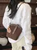 Bolso Cubo Retro de Bloques de Color de Moda con Cierre de Giro para Mujer 2025 Nueva Moda de Primavera Bolso de Hombro Cruzado Patchwork de Nicho