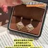 Nuevos Pendientes de Estilo Chino con Forma de Abanico Fluido para Mujer, Pendientes de Alta Gama y Exquisitos para Rostros Cuadrados y Redondos, Accesorios para Orejas Únicos y de Nicho