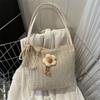 Bolso popular de este año para mujer 2023, nuevo bolso de cubo tejido a mano de moda para mujer, bolso de paja de gran capacidad