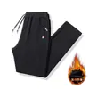 Calças de veludo de cordeiro para homens outono e inverno engrossadas calças casuais quentes calças pesadas de inverno para homens com calças esportivas da moda de veludo