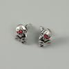 Pendientes de calavera con forma de sombrero y tijeras para Halloween.