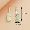 Fabricante de Accesorios para Instrumentos Musicales, Venta al por Mayor de Joyería DIY de Aleación Hecha a Mano, Accesorios para Joyería DIY con Goteo de Aceite